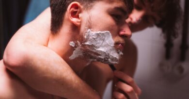 Two Men Shaving Beard Together