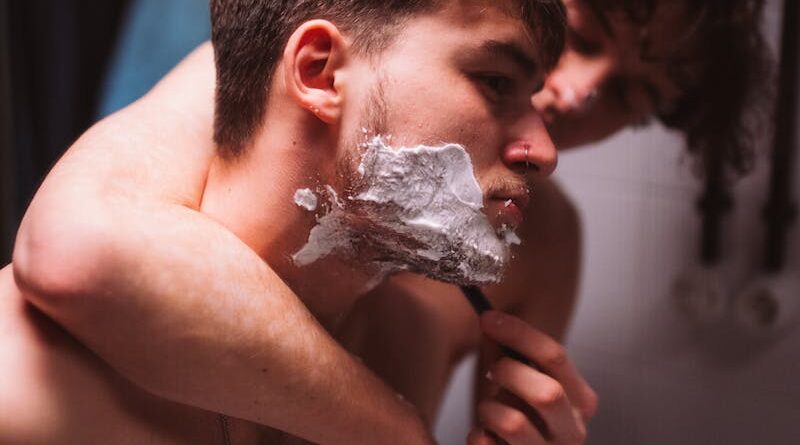 Two Men Shaving Beard Together