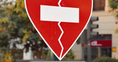 A street sign in Málaga, Spain highlighting the 'No Violencia Machista' message. Urban setting. No a la violencia machista